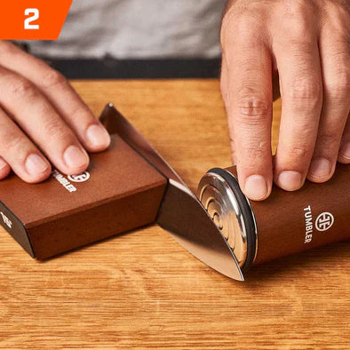ROLL SHARPENER ALONG THE BLADE